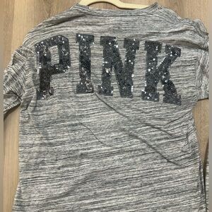 Pink long sleeve t-shirt.